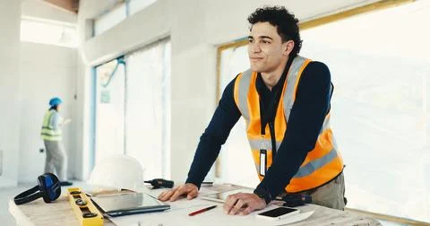 Architect, man and thinking with blueprint on construction site for building Foto stock