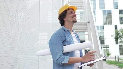 Architect man construction engineer worker or inspector stand outdoors Видео 248171982