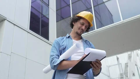 Architect man construction engineer worker or inspector stand outdoors Stock-Footage 248172351