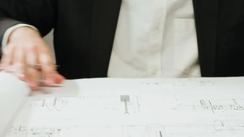 Architect man drawing plan blueprint close-up. Professional designer engineer Stock Footage 185575465