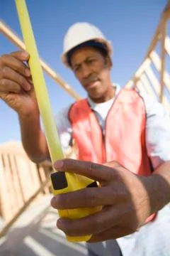 An Architect Measuring Framework With Measure Tape Stock Photos