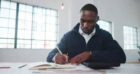 Architect, notebook and man in office with writing, design plan and draft of Stock Footage 341465131