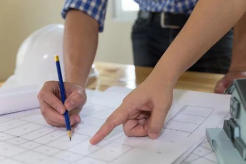 Architect or engineer meeting, working with blueprints in office, Construct.. Stock Photos