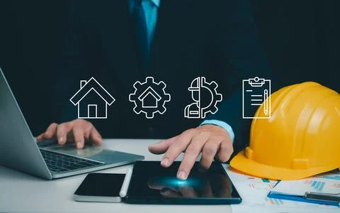 Architect or engineer using tablet to work on table, Cost calculation, cons.. 스톡 사진