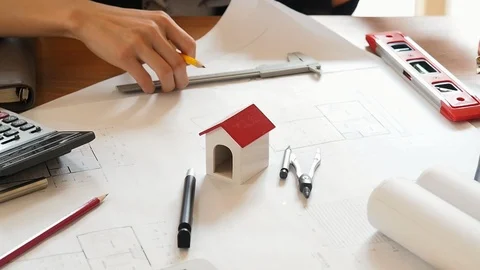 An architect or engineer working on blueprint, architectural concept. Stock Footage 103046939