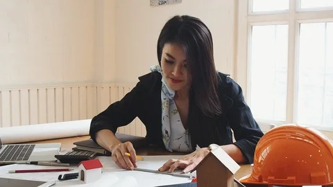 An architect or engineer working on blueprint, architectural concept. Stock Footage 108607153