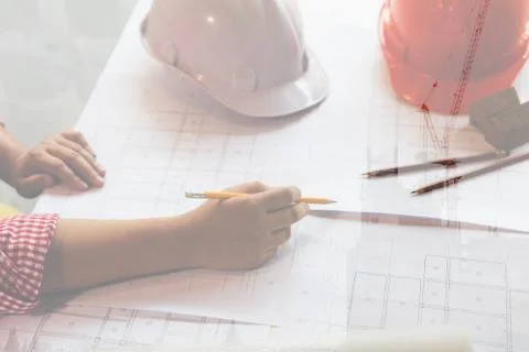 Architect or engineer working with blueprints in office, Construction conce.. Stock Photos