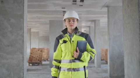 Architect or engineer working, browsing building project indoor of construction Stock Footage 113349360