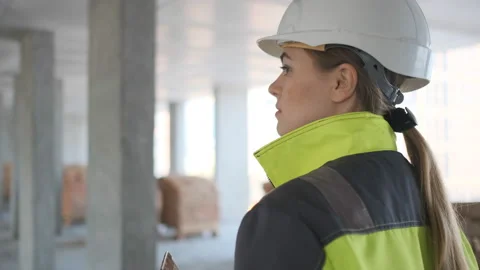 Architect or engineer working, browsing building project indoor of construction Stock Footage 113349447