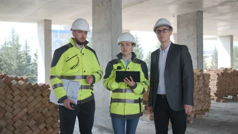 Architect or engineer working, browsing building project indoor of construction Stock Footage 113351599