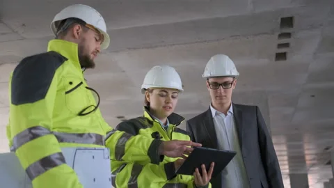 Architect or engineer working, browsing building project indoor of construction Stock Footage 113351941