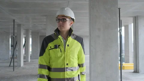 Architect or engineer working, browsing building project indoor of construction Stock Footage 113354011