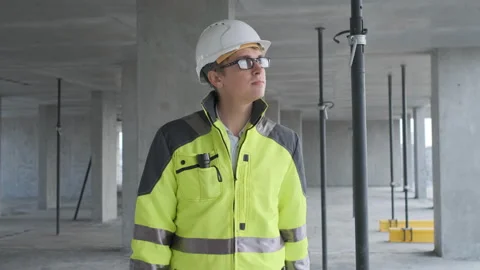 Architect or engineer working, browsing building project indoor of construction Stock Footage 113354025