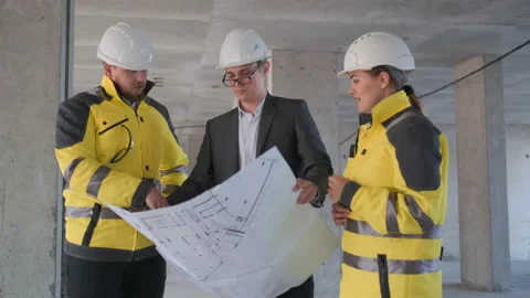 Architect or engineer working, browsing building project indoor of construction Video stock 114530177