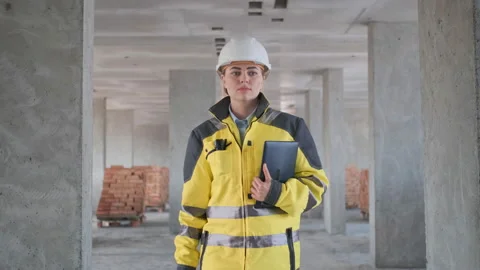 Architect or engineer working, browsing building project indoor of construction Video stock 114531620