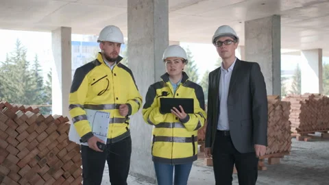 Architect or engineer working, browsing building project indoor of construction Video stock 114535266