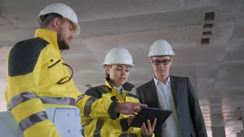 Architect or engineer working, browsing building project indoor of construction Video stock 114535668