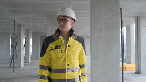 Architect or engineer working, browsing building project indoor of construction Stock Footage 114540514