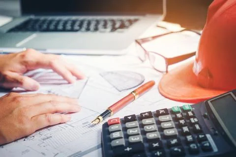 Architect or engineer working in office on blueprint. Architects workplace .. Foto stock