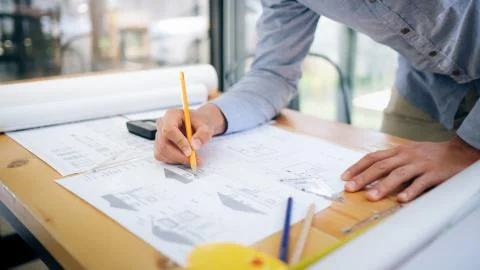 Architect or engineer working in office Stock Photos