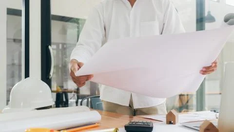 Architect or engineer working in office Stock Photos