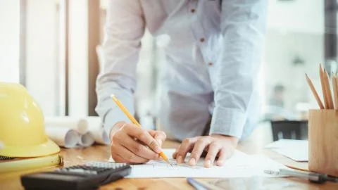 Architect or engineer working in office Stock Photos