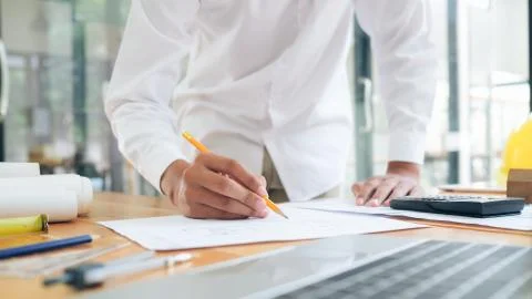 Architect or engineer working in office Stock Photos