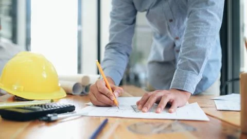 Architect or engineer working in office Stock Photos