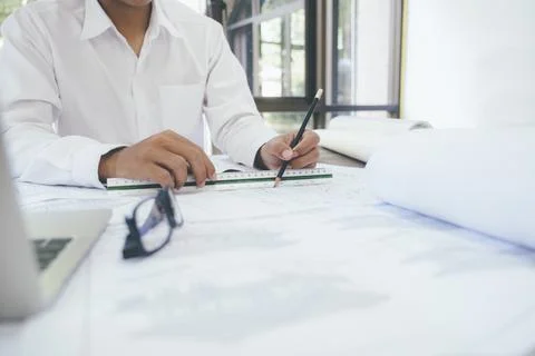 Architect or engineer working in office Stock Photos