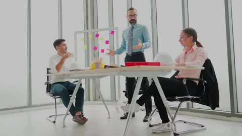 Architect or engineering manager or director working with team meeting Stock Footage 139744437