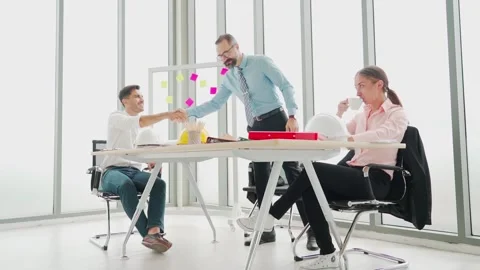 Architect or engineering manager or director working with team meeting Stock Footage 139744441