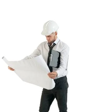 Architect or structural engineer with site plans in a hard hat. Stock Photos