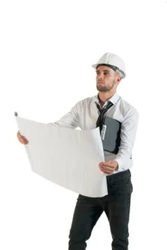 Architect or structural engineer with site plans in a hard hat. Stock Photos