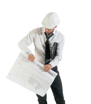 Architect or structural engineer with site plans in a hard hat. Foto stock