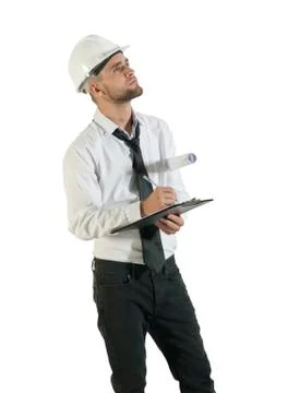Architect or structural engineer with site plans in a hard hat. Stock Photos