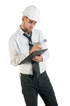 Architect or structural engineer with site plans in a hard hat. Stock Photos