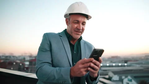 Architect, phone and man typing in city for construction schedule, funny message Stock Footage 338021612