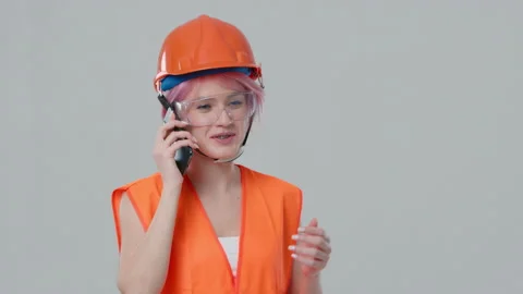 Architect phone call regarding construction site on white studio background 4K Video stock 230706255