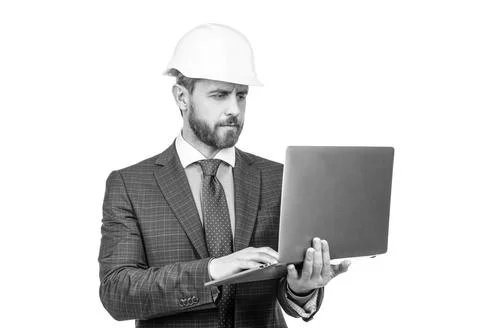 Architect planning work. chief engineer in hardhat use computer. mature ceo Stock Photos