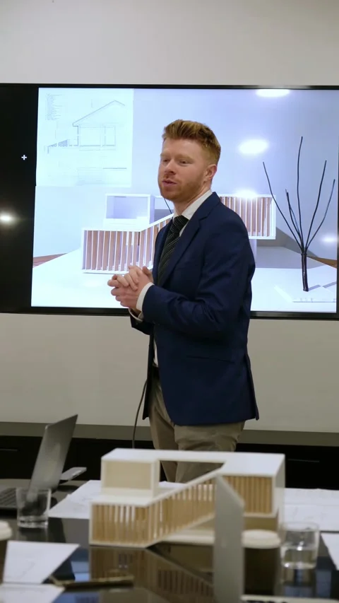 Architect presenting new sustainable building project Stock Footage 343927799