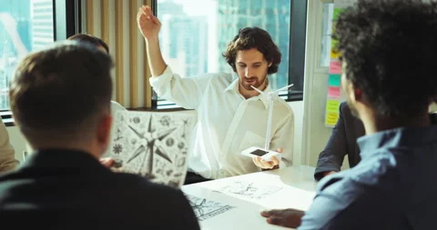 Architect presenting solar concept in team meeting Stock Footage 306100914