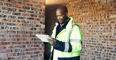 Architect, reading and black man with tablet for construction, research and.. Fotos Stock