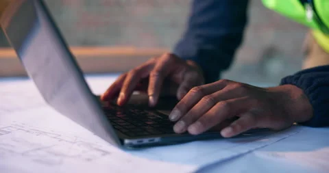 Architect, research and hands with laptop in building site, online and info for Stock Footage 337014571