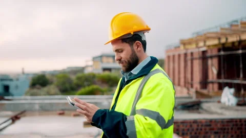 Architect, research and man with tablet at building site, scroll and safety Stock Footage 336201262