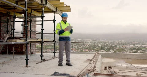 Architect, research and man with tablet on building site, info and planning for Stock Footage 337629177