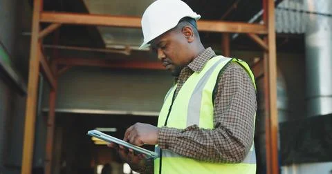 Architect, research and man with tablet on construction site, scroll and plan Stock Photos