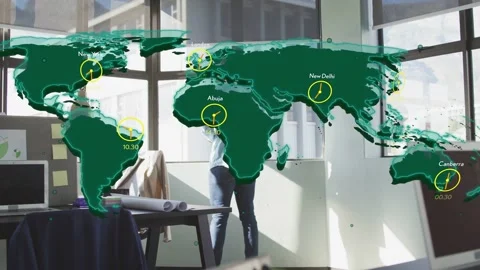Architect shifting posture by window while world map overlay appearing, showing Stock Footage 334728957