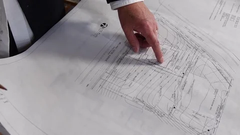 Architect showing plans Stock Footage 70336781
