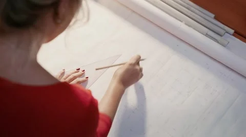 Architect Student Doing Homework Erasing Lines On Plan Stock Footage 56364369