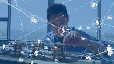Architect studying model while center node emerging, network expanding and he Stock Footage 331048278